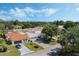 Charming single-story home featuring a screened porch and well-manicured front lawn at 259 Mariposa, Winter Haven, FL 33884