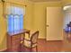 Bedroom with desk and window, offering a cozy, functional space at 2611 State Road 557, Lake Alfred, FL 33850