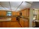Spacious kitchen with ample cabinet space and stainless steel appliances at 2611 State Road 557, Lake Alfred, FL 33850