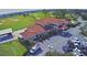 Aerial view of clubhouse overlooking the golf course at 2721 Kokomo Loop, Haines City, FL 33844