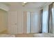 This bedroom offers a double-door closet and an entryway to the rest of the home at 2721 Kokomo Loop, Haines City, FL 33844