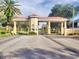 Exterior image of the community's entrance with well-maintained landscaping at 2721 Kokomo Loop, Haines City, FL 33844