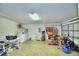 Spacious garage interior with laundry area and ample storage space at 2721 Kokomo Loop, Haines City, FL 33844
