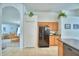 Kitchen view into dining area and living area at 2721 Kokomo Loop, Haines City, FL 33844
