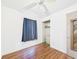 A bright bedroom with wood floors and a closet at 2726 Prine Rd, Lakeland, FL 33810