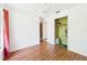 Bright bedroom featuring wood floors, closet and natural light at 2726 Prine Rd, Lakeland, FL 33810
