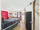 View of the bedroom, including the hardwood flooring and doorway at 2726 Prine Rd, Lakeland, FL 33810
