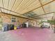 Wide carport with a covered area for parking and storing a boat with easy access to utilities and outdoor space at 2726 Prine Rd, Lakeland, FL 33810