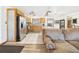 Open kitchen featuring stainless steel appliances, tile floors, and wood cabinets at 2726 Prine Rd, Lakeland, FL 33810