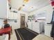 Functional laundry space with a washer, dryer, ample storage, and a utility sink at 2726 Prine Rd, Lakeland, FL 33810