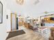 Open-concept living and dining area with modern appliances and rustic-style decor with plenty of room at 2726 Prine Rd, Lakeland, FL 33810