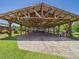 Open-air pavilion with rustic decor and ample space for gatherings at 2726 Prine Rd, Lakeland, FL 33810