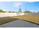 Backyard featuring a fenced in yard and a small concrete patio at 310 N 1St Ave, Bartow, FL 33830