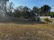 A spacious backyard with a full perimeter fence at 3265 Conine, Winter Haven, FL 33881