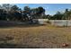 A spacious backyard with a full perimeter fence at 3265 Conine, Winter Haven, FL 33881