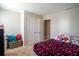Cozy bedroom with a bed, closet, and colorful decor, perfect for a  at 3440 Dahlia Dr, Haines City, FL 33844