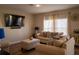 Comfortable living room with plush sofas, decorative pillows, and ambient lighting, ideal for relaxation at 3440 Dahlia Dr, Haines City, FL 33844