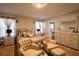 Inviting main bedroom featuring plush bedding, ambient lighting, and a cozy sitting area, perfect for unwinding at 3440 Dahlia Dr, Haines City, FL 33844