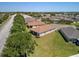 Aerial view of a community with houses and mature trees and landscaping at 3565 Raleigh Dr, Winter Haven, FL 33884