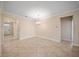 Inviting interior space featuring tile flooring, chandelier, and neutral paint at 3565 Raleigh Dr, Winter Haven, FL 33884