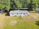 This cozy home has a well-maintained lawn and private setting at 3611 Island Oaks Ct, Lakeland, FL 33805