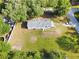 This cozy home has a spacious yard with lush greenery and a private setting at 3611 Island Oaks Ct, Lakeland, FL 33805