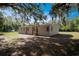 Charming single-story home nestled among mature trees, offering a peaceful and private setting at 3611 Island Oaks Ct, Lakeland, FL 33805