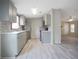 Modern kitchen with stainless steel appliances, sleek countertops, durable floors, and ample cabinet space at 3611 Island Oaks Ct, Lakeland, FL 33805