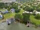 Waterfront community with luxurious homes, lush landscaping and private docks, offering a blend of nature and upscale living at 3826 Gaines Ct, Winter Haven, FL 33884