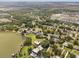 Lakefront community featuring luxurious homes nestled amongst mature trees and ample green space, a peaceful and scenic neighborhood at 3826 Gaines Ct, Winter Haven, FL 33884