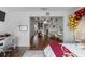 Bedroom featuring wood floors, party decor, and a partial view of the bed at 3826 Gaines Ct, Winter Haven, FL 33884