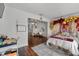 Cheerful bedroom featuring a partial bed view and festive decor, creating a playful space at 3826 Gaines Ct, Winter Haven, FL 33884