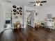 Bedroom view showcasing wood floors, decor, and a cozy seating area, creating a warm atmosphere at 3826 Gaines Ct, Winter Haven, FL 33884