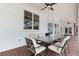 Spacious covered patio with ample seating, ideal for outdoor dining and entertaining at 3826 Gaines Ct, Winter Haven, FL 33884