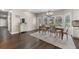Spacious dining area with hardwood floors and natural light from outdoor views at 3826 Gaines Ct, Winter Haven, FL 33884