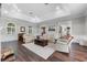 Bright and airy living room with fireplace, recessed lighting, and ample seating at 3826 Gaines Ct, Winter Haven, FL 33884