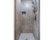 Modern shower with tiled walls, recessed shelf and contemporary fixtures at 3826 Gaines Ct, Winter Haven, FL 33884