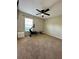 Minimalist room with rower exercise machine and a large sunny window at 3851 Horizon View Loop, Lakeland, FL 33813