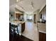 Spacious kitchen featuring tile flooring, granite countertops, and stainless steel appliances at 3851 Horizon View Loop, Lakeland, FL 33813