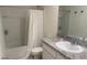 Bathroom featuring a shower/tub combo and granite countertop at 386 Feltrim Reserve Blvd # 386, Davenport, FL 33837