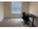 Bedroom featuring neutral carpet and a desk, perfect for a home office at 386 Feltrim Reserve Blvd # 386, Davenport, FL 33837