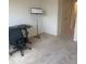 Bedroom featuring neutral carpet and a desk, perfect for a home office at 386 Feltrim Reserve Blvd # 386, Davenport, FL 33837