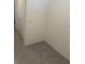 Bright entryway with ceramic tile flooring and neutral walls creates a welcoming ambiance with access to adjacent living spaces at 386 Feltrim Reserve Blvd # 386, Davenport, FL 33837