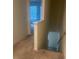 Hallway with neutral carpets leading down stairs at 386 Feltrim Reserve Blvd # 386, Davenport, FL 33837