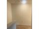 Hallway with neutral carpet, an attic access panel, and an electrical outlet at 386 Feltrim Reserve Blvd # 386, Davenport, FL 33837