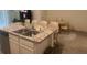 Kitchen island with granite counter, open to the living spaces and dining room at 386 Feltrim Reserve Blvd # 386, Davenport, FL 33837