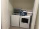 Convenient laundry room with modern washer and dryer at 386 Feltrim Reserve Blvd # 386, Davenport, FL 33837