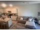 Cozy living room with modern appliances and comfortable seating at 386 Feltrim Reserve Blvd # 386, Davenport, FL 33837