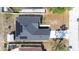 Birds eye view of house showcases the roof, and neighborhood at 404 Rio Grande Ct, Poinciana, FL 34759