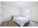 Bright bedroom features carpeted floors and a window providing natural light at 404 Rio Grande Ct, Poinciana, FL 34759